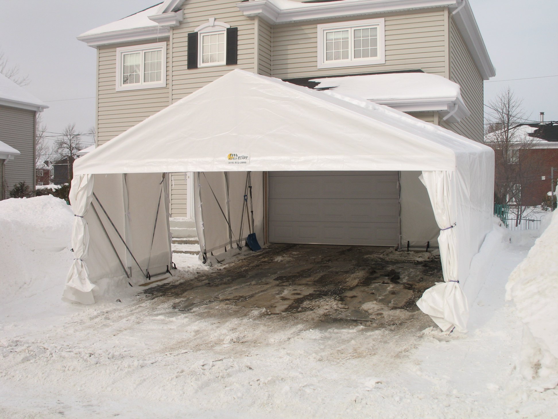 Abri d'auto et garage en hiver par Abris-Temps